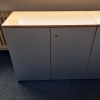 zwei Sideboards in Echtholzfurnier Buche mit Flügeltüren in silber