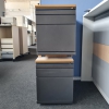 gebrauchter Rollcontainer aus anthrazitfarbenen Stahl und heller Abdeckplatte