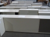 Lager mit Reihen von Sideboards in verschiedenen Varianten